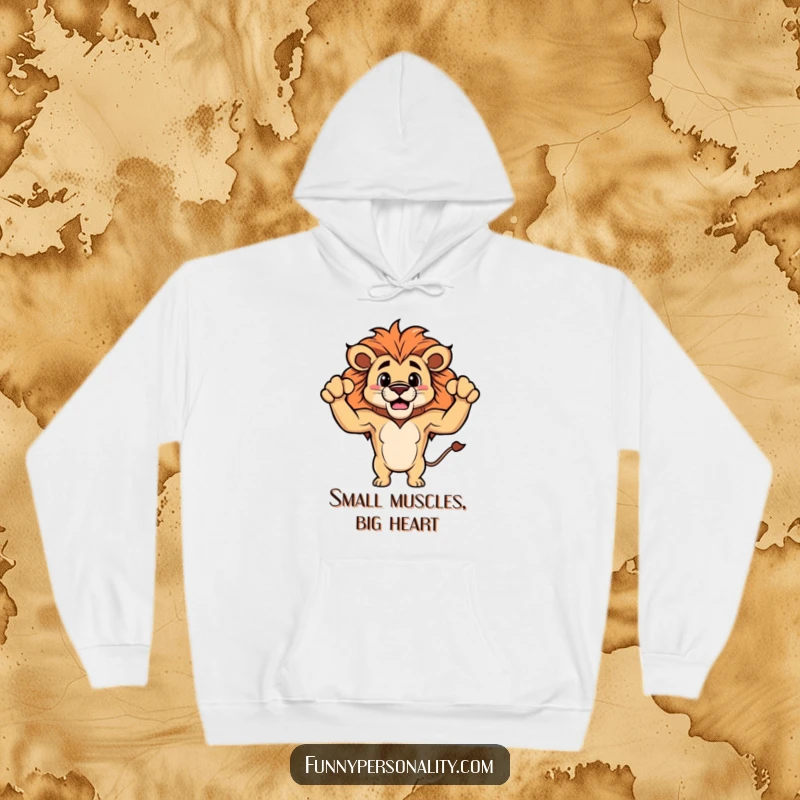 Funny hoodie depicting a proud lion character flexing surprisingly small, fluffy biceps, offering warmth and humor.