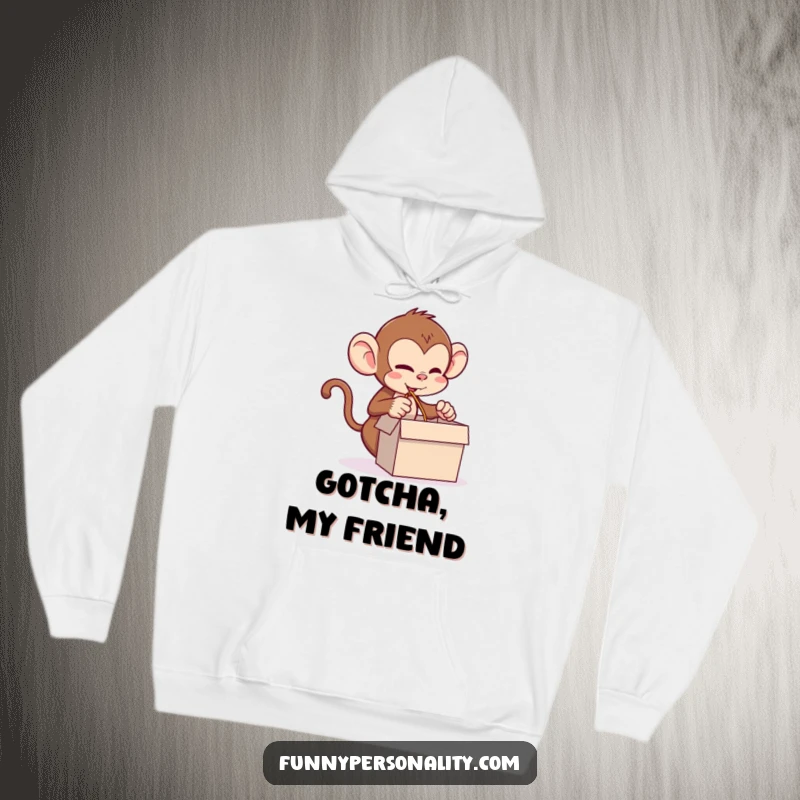 Funny monkey hoodie featuring a mischievous monkey pulling a long string from a small box, ideal for cozy fun.