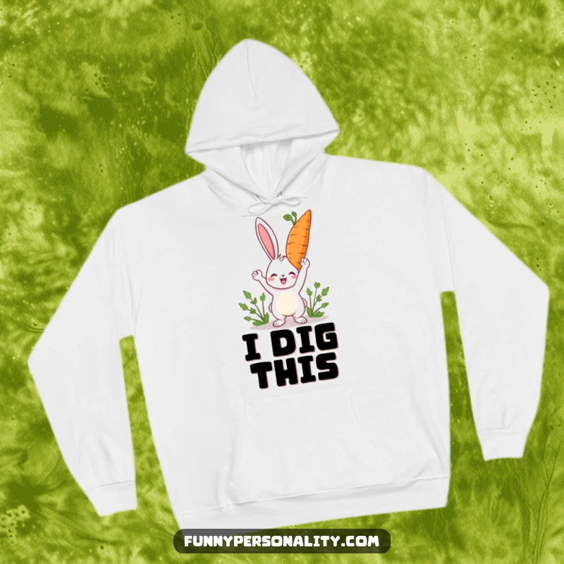 Funny rabbit hoodie featuring a happy character holding a giant carrot, representing comfort and cheerful victory.